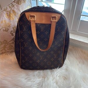 Louis Vuitton
Monogram Excursion Shoe Bag